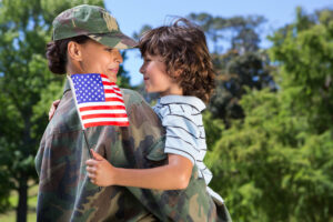 female veteran with her son