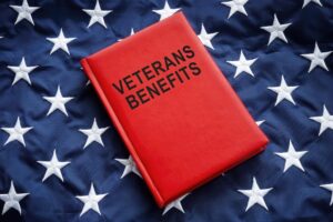 book for veterans benefits on a flag